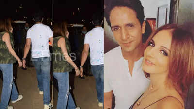 Sussanne Khan and rumoured beau Arslan Goni get clicked together walking hand-in-hand post dinner date