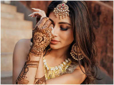 Mouni Roy shares stunning pictures from her mehendi photoshoot; can you spot Suraj Nambiar's initials?