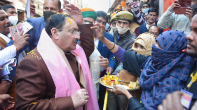 Two Muslim women perform Nadda's 'aarti' during campaign in Shikohabad