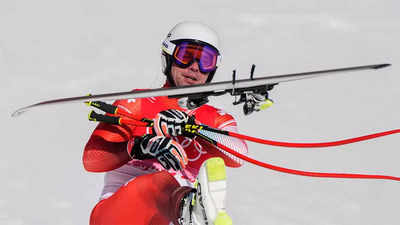 2022 Winter Olympics: Switzerland's Beat Feuz takes men's downhill gold