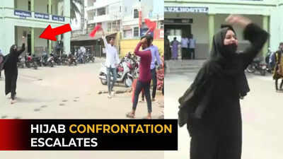 Karnataka: Girl in hijab enters college, heckled by students wearing saffron stoles