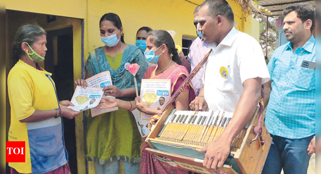 Coimbatore Candidate plays harmonium for votes Coimbatore News