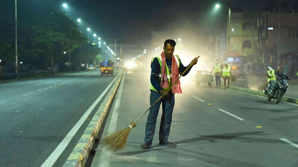 Sanitary workers cleaning roads