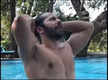
Varun Dhawan goes retro while enjoying his pool time; Arjun Kapoor says, 'This pool didn’t need you to swim'
