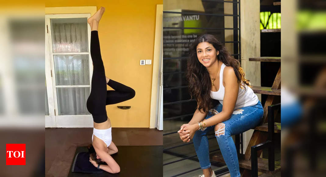 Virat Kohli Helps Out Anushka Sharma With Her Yoga Pose | Filmfare.com