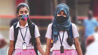 Karnataka institutes open, 13 skip exam over hijab