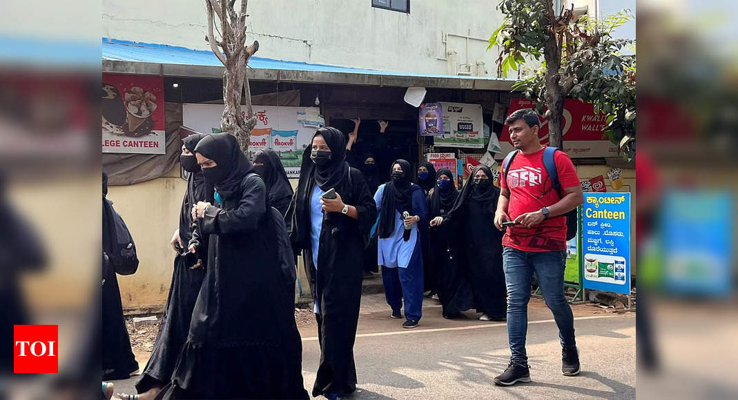 Karnataka: Minority welfare dept cites HC order, bars students from wearing saffron shawls, scarfs, hijab – Times of India