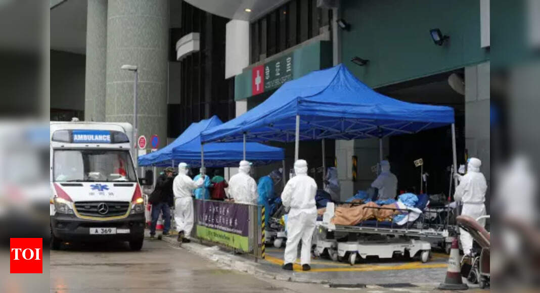 Hong Kong reports more than 6,000 new cases in virus surge - Times of India