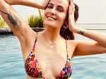 Bikini-clad Mandana Karimi is turning up the heat with her new pool pictures