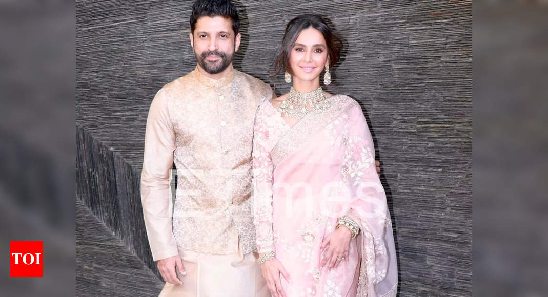 Farhan Akhtar and wife Shibani Dandekar make their first appearance after marriage; newlyweds distribute sweets to shutterbugs – Pics – Times of India
