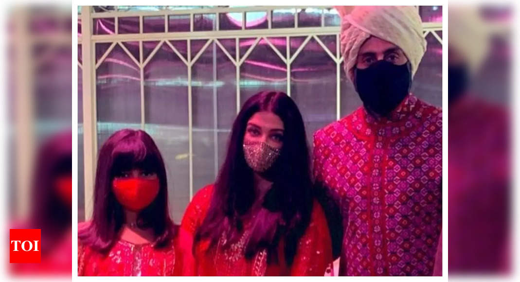 Aishwarya Rai and Abhishek Bachchan twin with daughter Aaradhya in red at Anmol Ambani’s wedding – See pic – Times of India