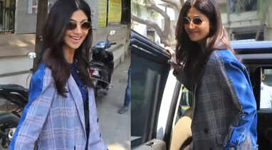 Shilpa Shetty Kundra poses for paparazzi after a salon session