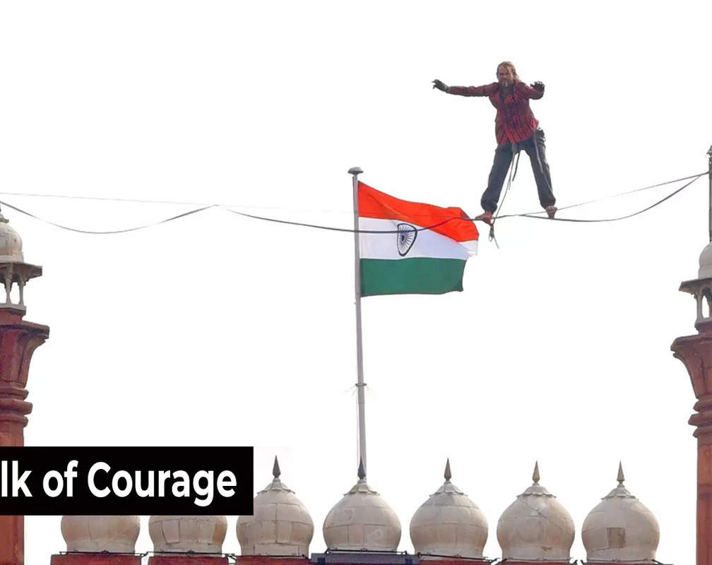 
Daredevil German slackliner walks on a rope more than 30 metres above the ground at Red fort
