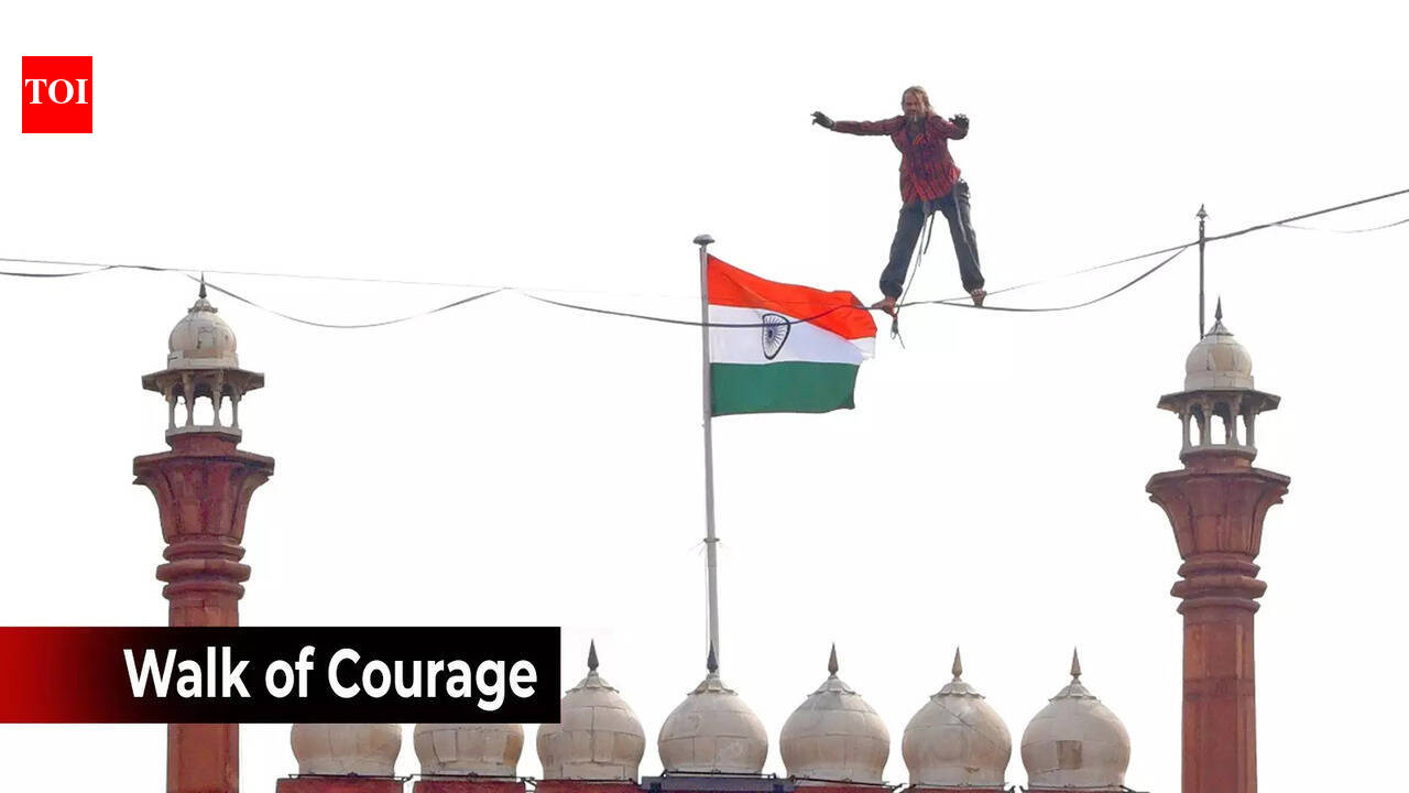 Daredevil German slackliner walks on a rope more than 30 metres above ...