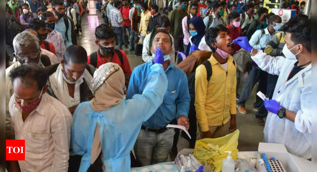 India reports 6,915 new Covid infections; active cases below 1 lakh after 2 months | India News – Times of India