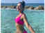 Rakul Preet Singh flaunts her toned body in a bright pink bikini as she strikes a pose in the water – See pic