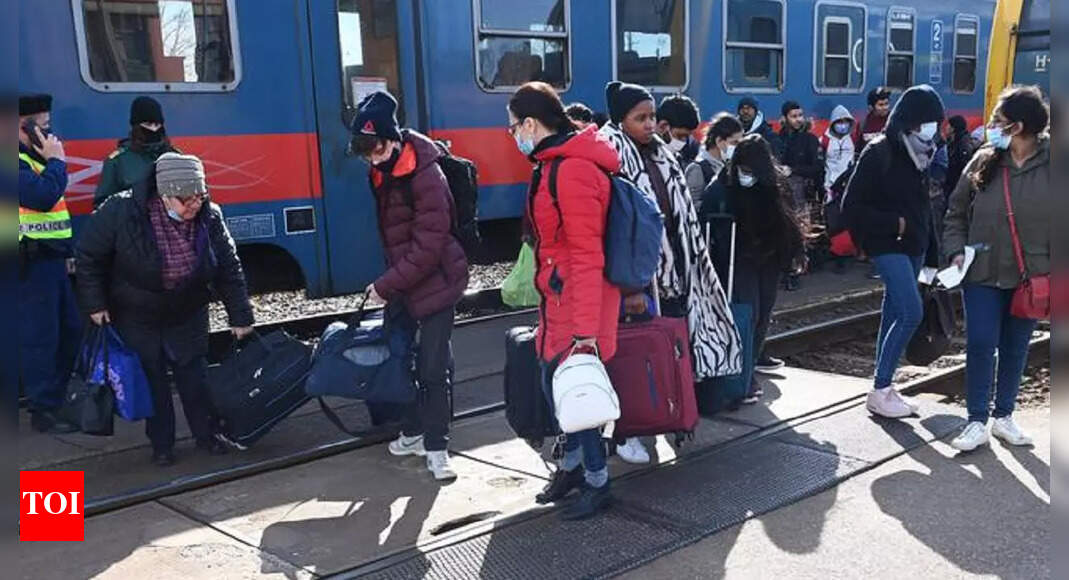 After long walk, struggle to board train at Kharkiv stn