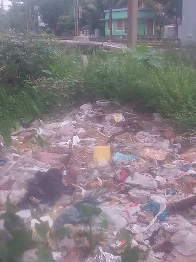 dumping waste bags near railway track