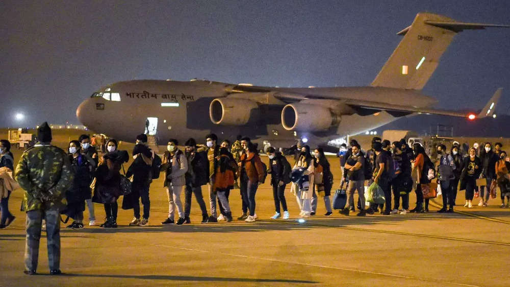 In pics: Minister Ajay Bhatt welcomes students as they arrive at Ghaziabad's Hindon air base