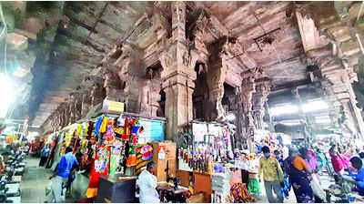 Court orders status quo on shifting shops from temple