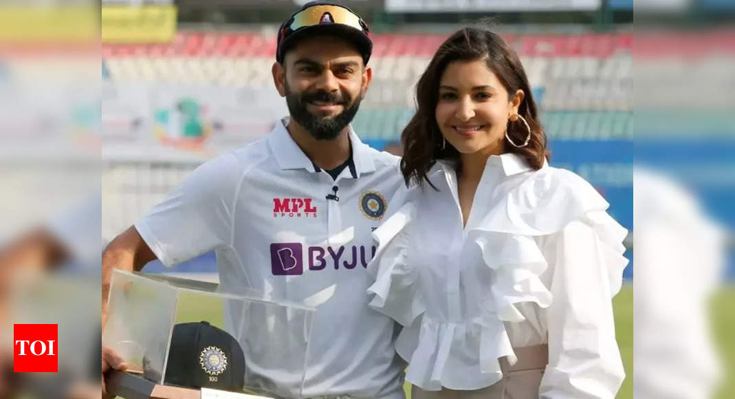 Anushka Sharma accompanies Virat Kohli to field before kickstarting his 100th test match, netizens react – Times of India