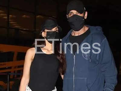 John Abraham & Priya Runchal snapped at the airport
