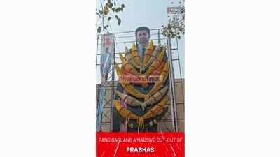 Radhe Shyam: Fans in Hyderabad garland a massive cut-out of Prabhas