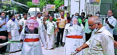 Laity activists stage protest by burning effigies
