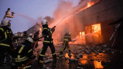 Rescuers search theatre rubble as Russian attacks continue