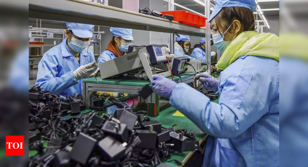China’s factory, services sectors slump together for first time since 2020 – Times of India