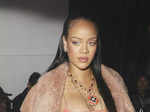 Rihanna flaunts her baby bump in a belly-baring black sheer dress at Beyonce & Jay-Z's party