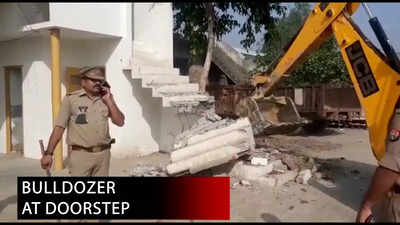 UP Police raze parts of house belonging to two rape accused, video goes viral