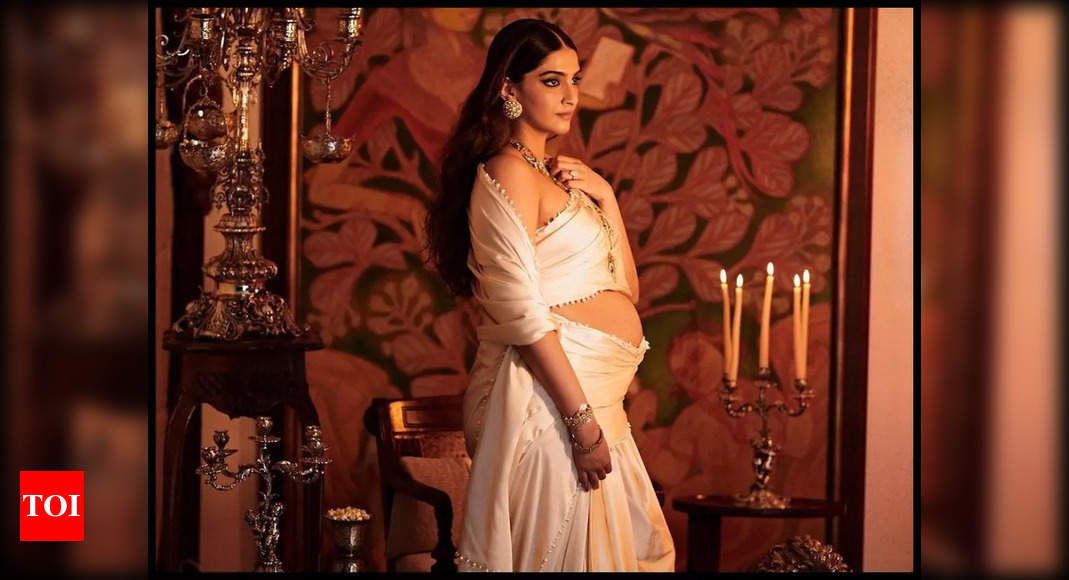 Sonam Kapoor Ahuja shows off baby bump in white saree; Here’s what Anil Kapoor, Anand Ahuja and others have to say – Times of India