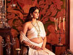 Mom-to-be Sonam Kapoor flaunts her baby bump in these new pictures in an ivory saree