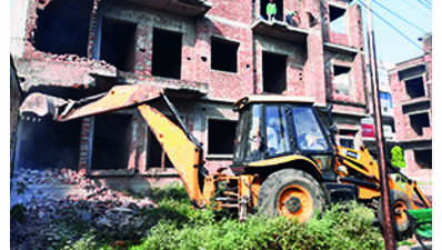 Villagers attack bulldozer during demolition drive