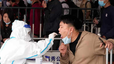 China closes Guangzhou to most arrivals as outbreak spreads
