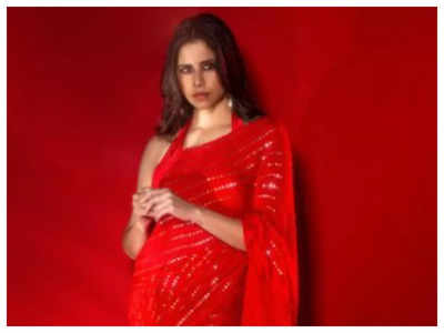 Sai Tamhankar looks ravishing in red saree; See pics
