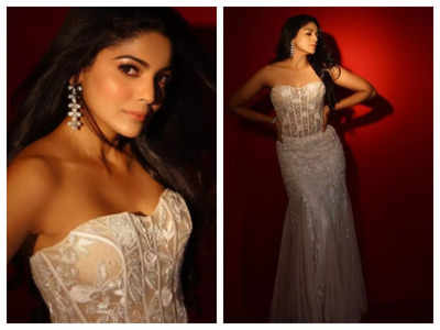 Pooja Sawant amps up the glamour quotient in a white off-shoulder gown; See pics