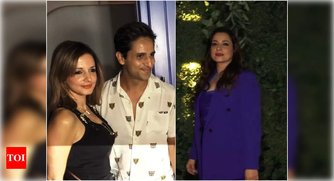 Sussanne Khan and rumoured beau Arslan Goni pose for the paparazzi together at Neelam Kothari’s party in town – Times of India