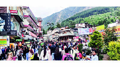 Tourists throng hill stations, snow-bound Marhi opens