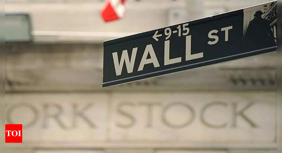 Wall St ends lower as investors await further earnings cues – Times of India