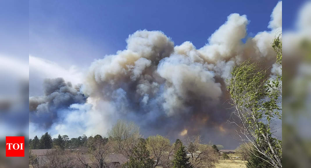 Thousands flee as Arizona wildfire almost triples in size – Times of India