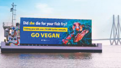 Floating billboards highlight plight of turtles on Earth Day