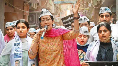 AAP marches against ‘hooliganism’, BJP says prove charge or face action