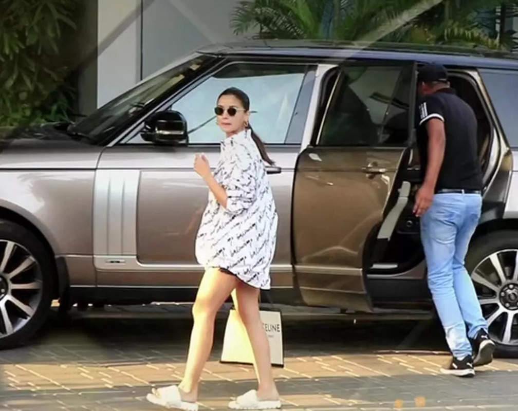 
With white oversized shirt paired with black shorts, Alia Bhatt aces her casual style
