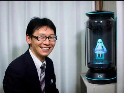 Man marries a computerised version of a pop star; left alone due to discontinued technology