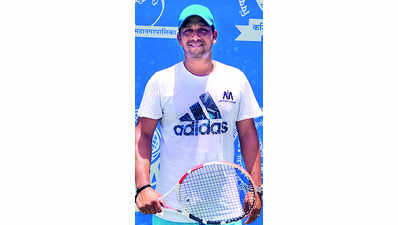 Dhumal wins a double in first tournament in a decade