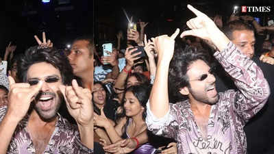 Kartik Aaryan poses and dances with fans as he promotes 'Bhool Bhulaiyaa 2' at a club Mumbai