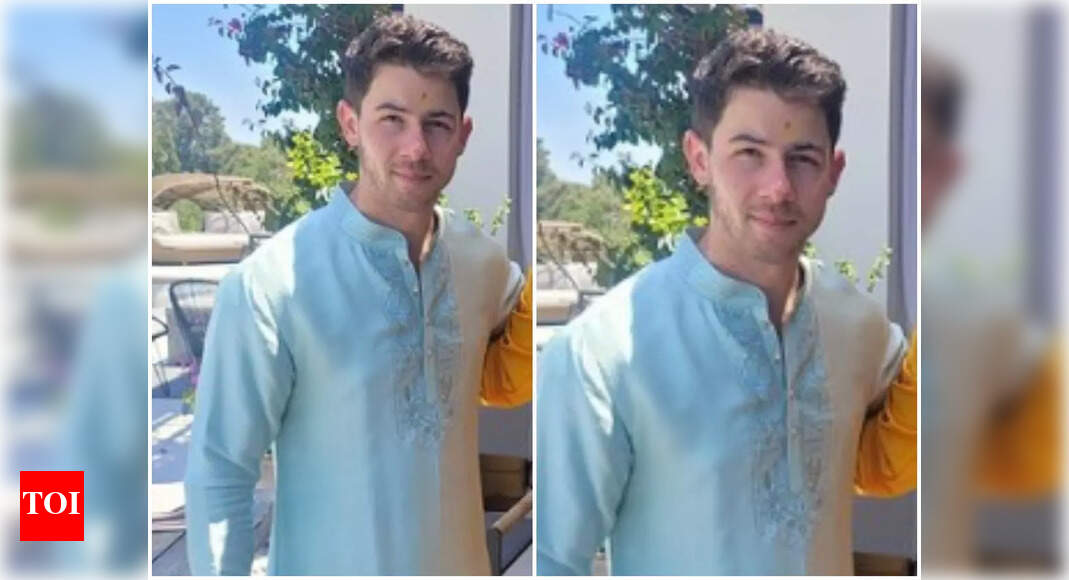 Nick poses in a kurta; see picture