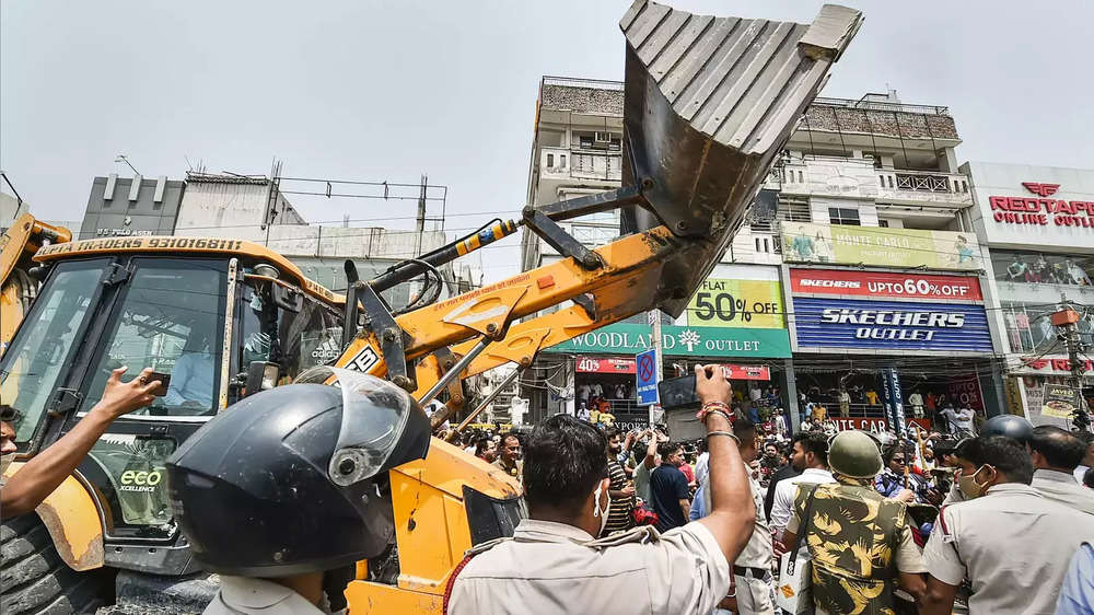 In Pics: Protests Erupt As Bulldozers Roll Into Delhi's Shaheen Bagh ...